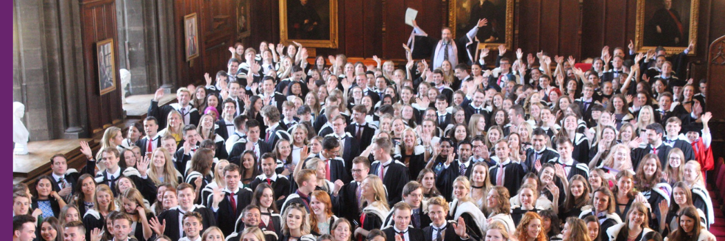 Grant Slater with lots of students before Congregation in the Great Hall