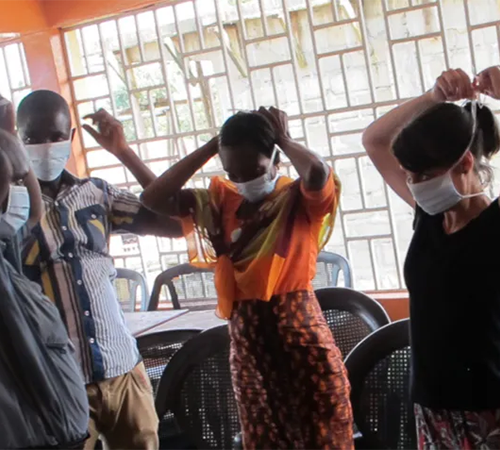 People putting on face masks