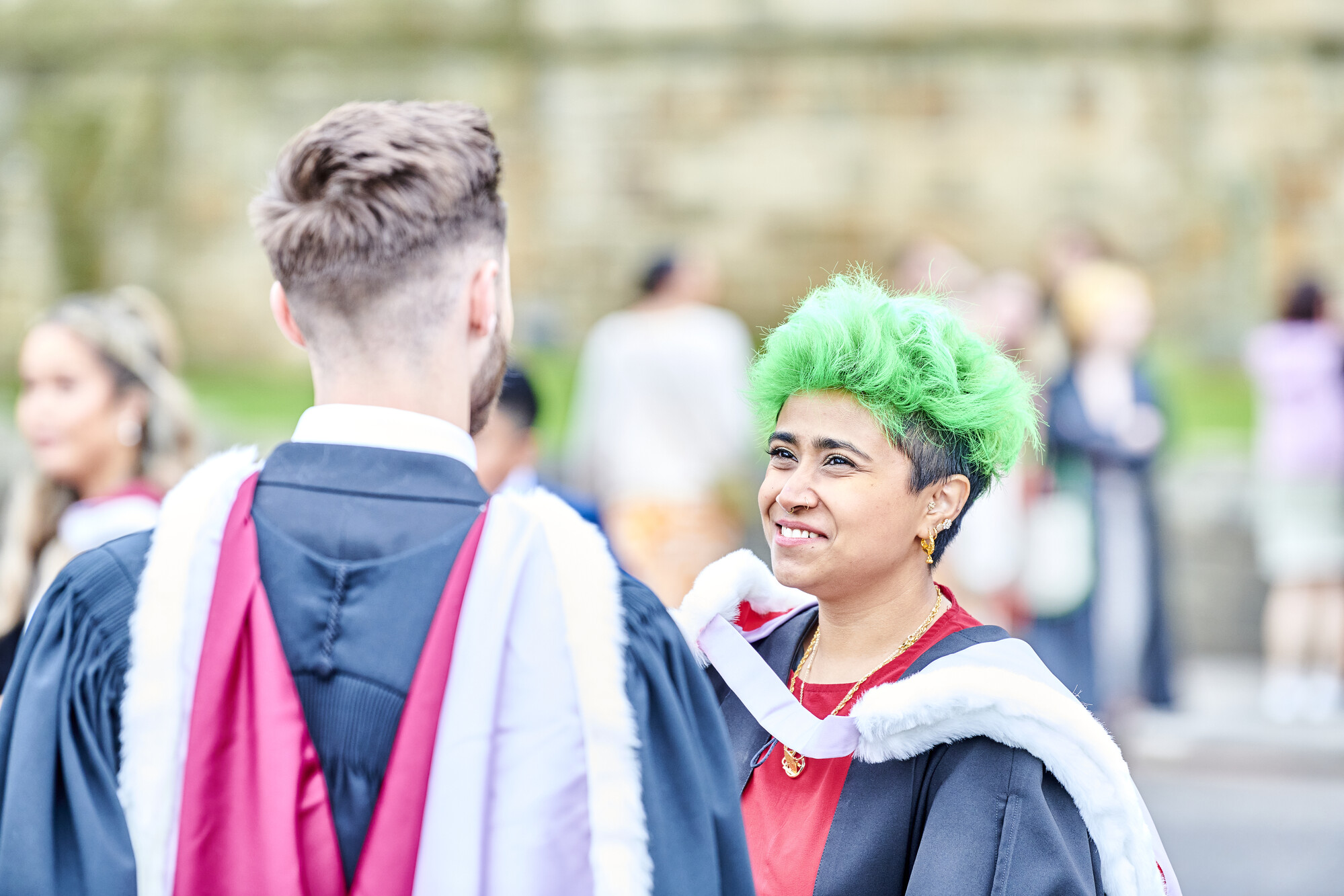 Graduands talking outside Durham Cathedral