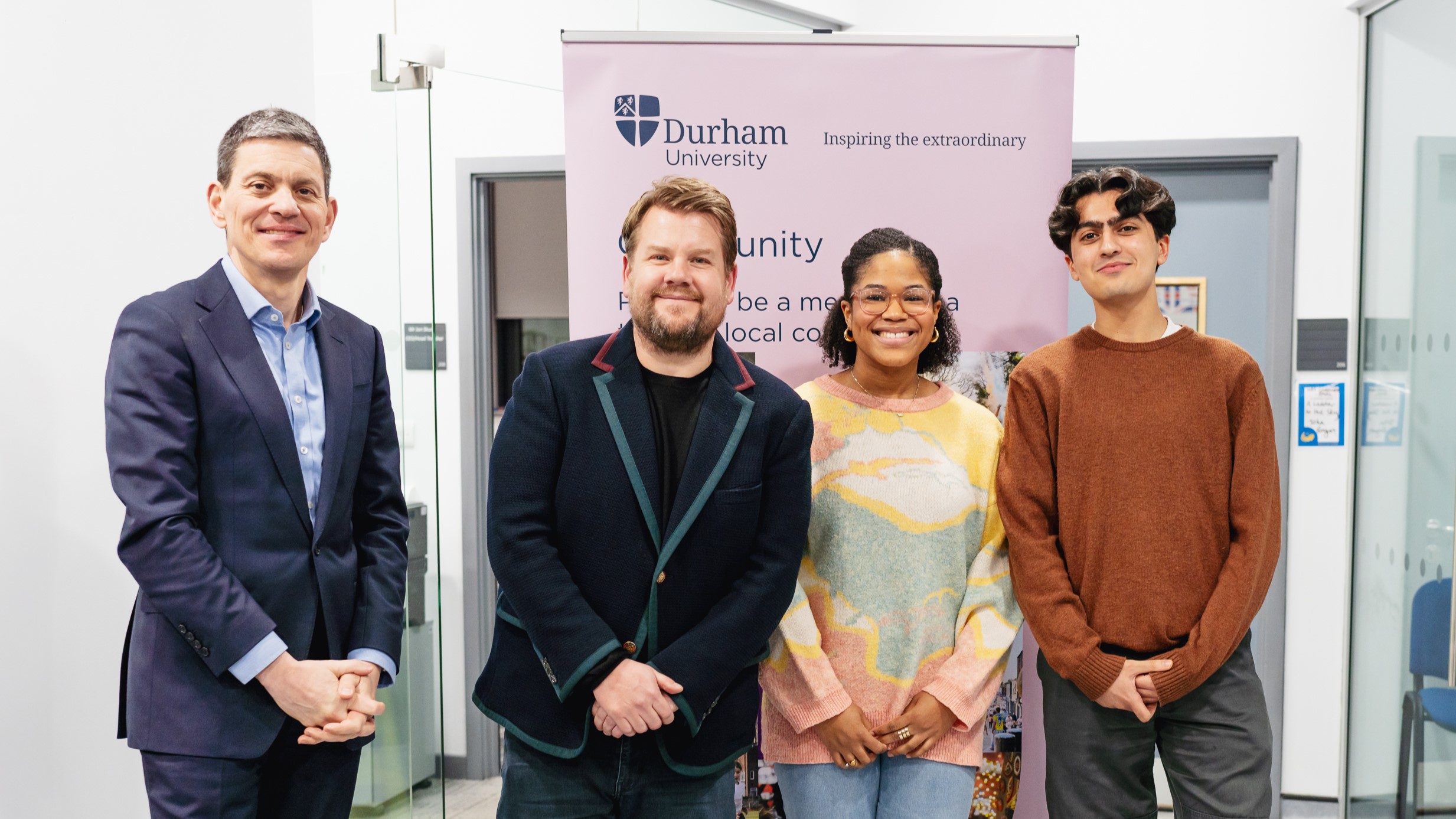 James Corden and David Miliband with students