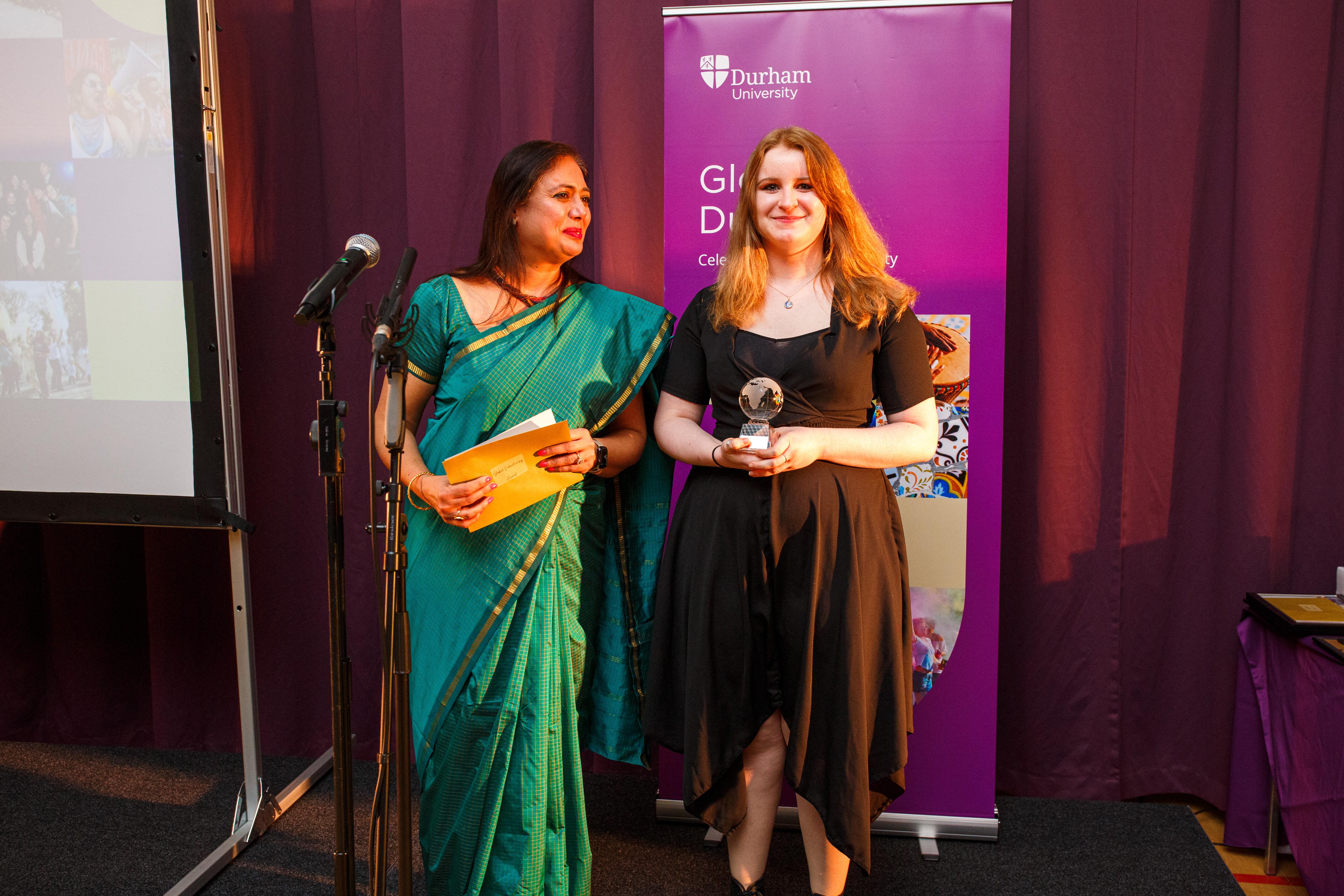 Alexandra Hart receiving the Global Volunteering Award