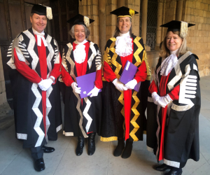 Chancellor, Vice-Chancellor and two Pro VCs in gowns