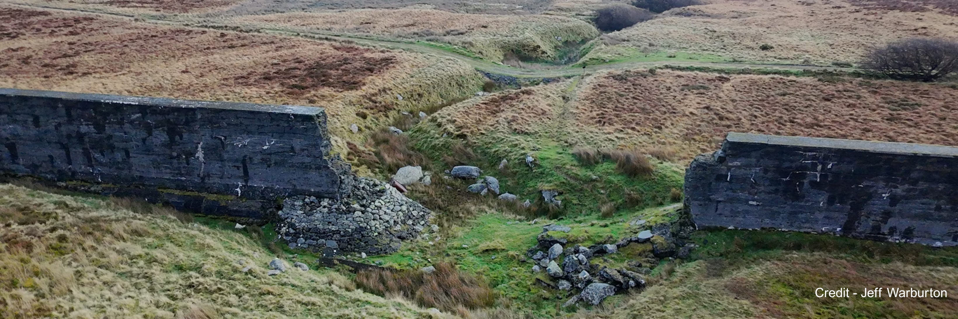 The breach in the Eigiau Dam where the channel conveyed water across the plateau to the Coedty reservoir two miles downstream.