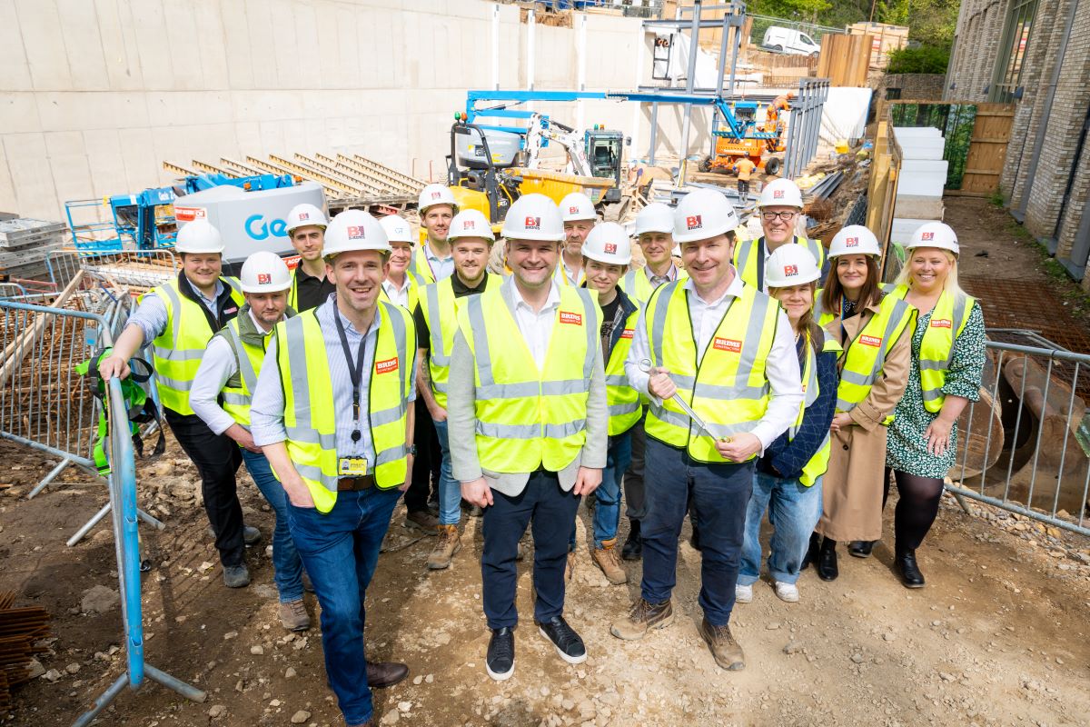 A group f staff from Durham University, Unite Students and Brims Construction, attending the golden bolt ceremony at Rushford Court