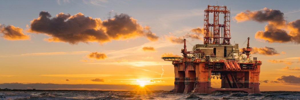 An image of an oil rig in the sea.