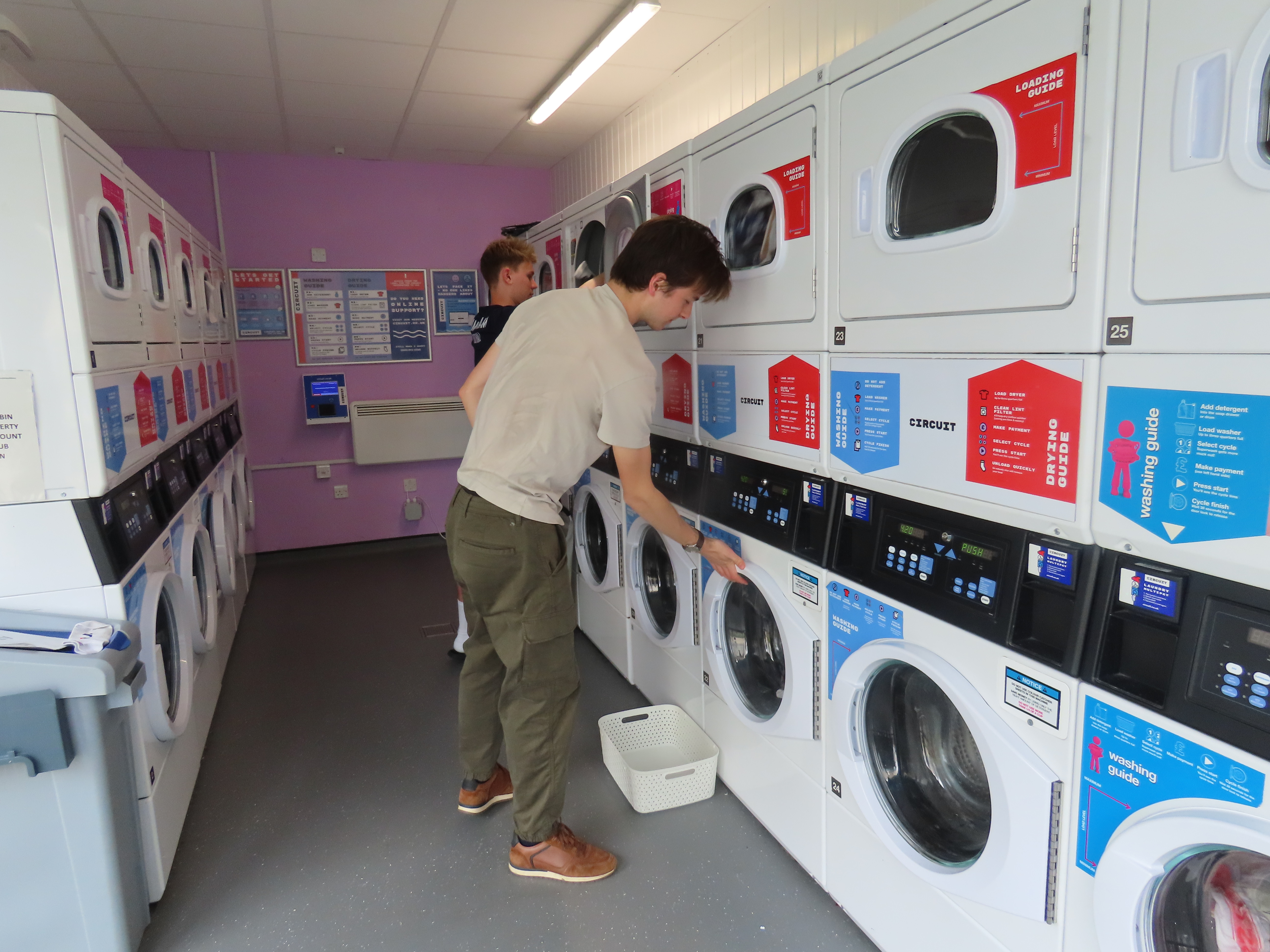 Students using the laundry facilities