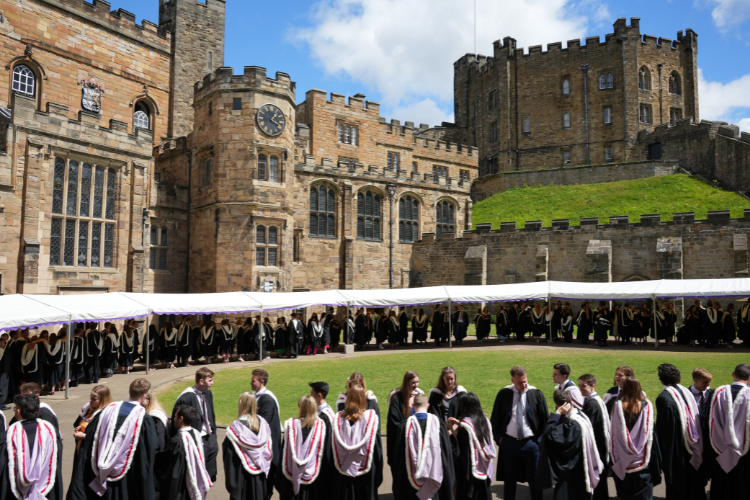 Students lined up for graduation outside Durham Castle