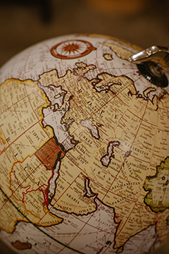 Photo by Kübra  Kuzu: https://www.pexels.com/photo/a-close-up-of-a-globe-with-a-map-on-it-17185764/