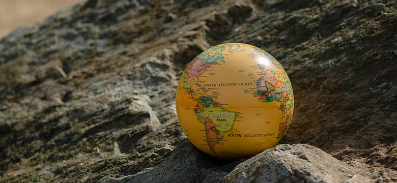 Tiny globe on a rock