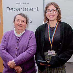 Photograph of Anna receiving his award, presented by Paula Chadwick.