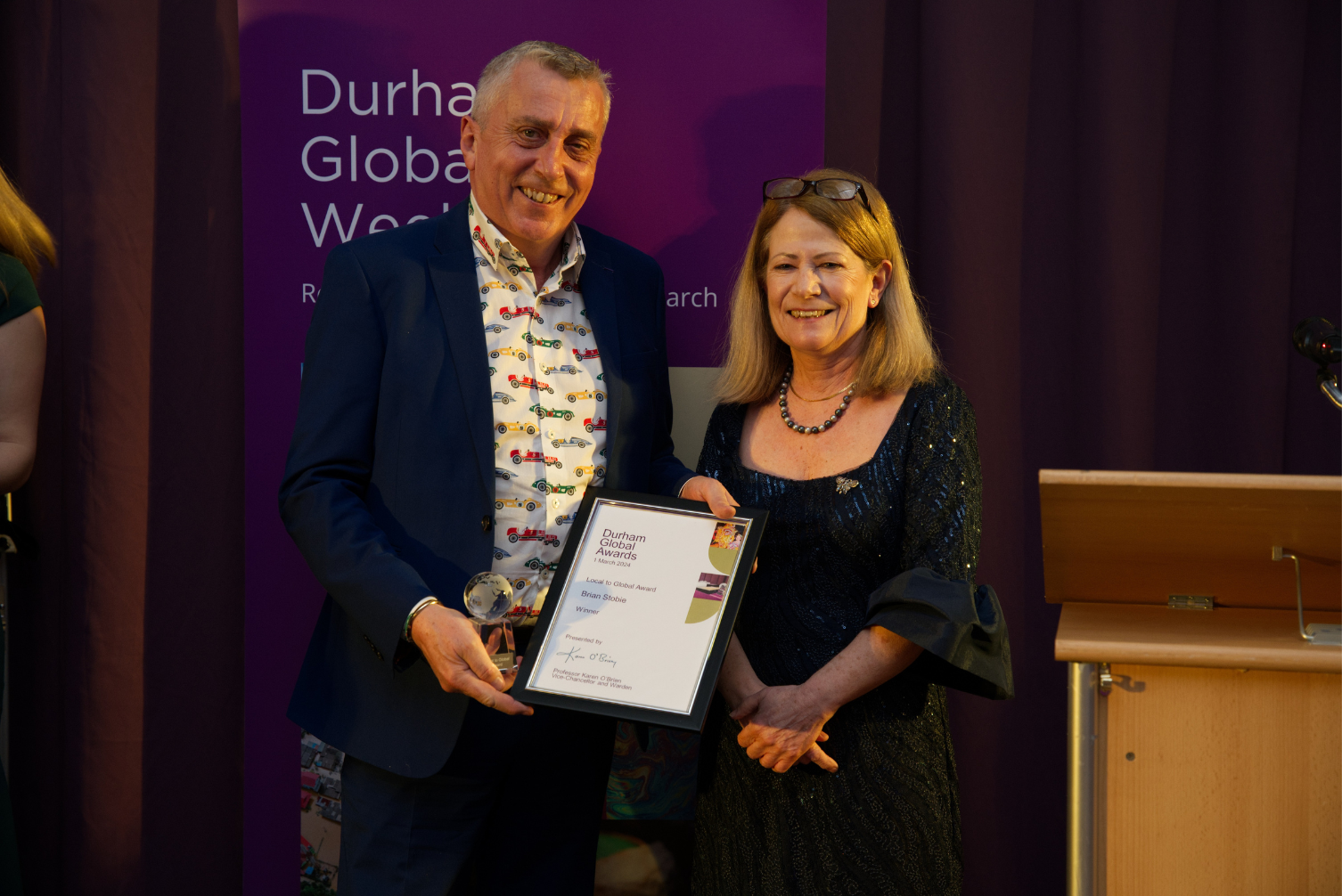 Brian Stobie receiving the Local to Global Award