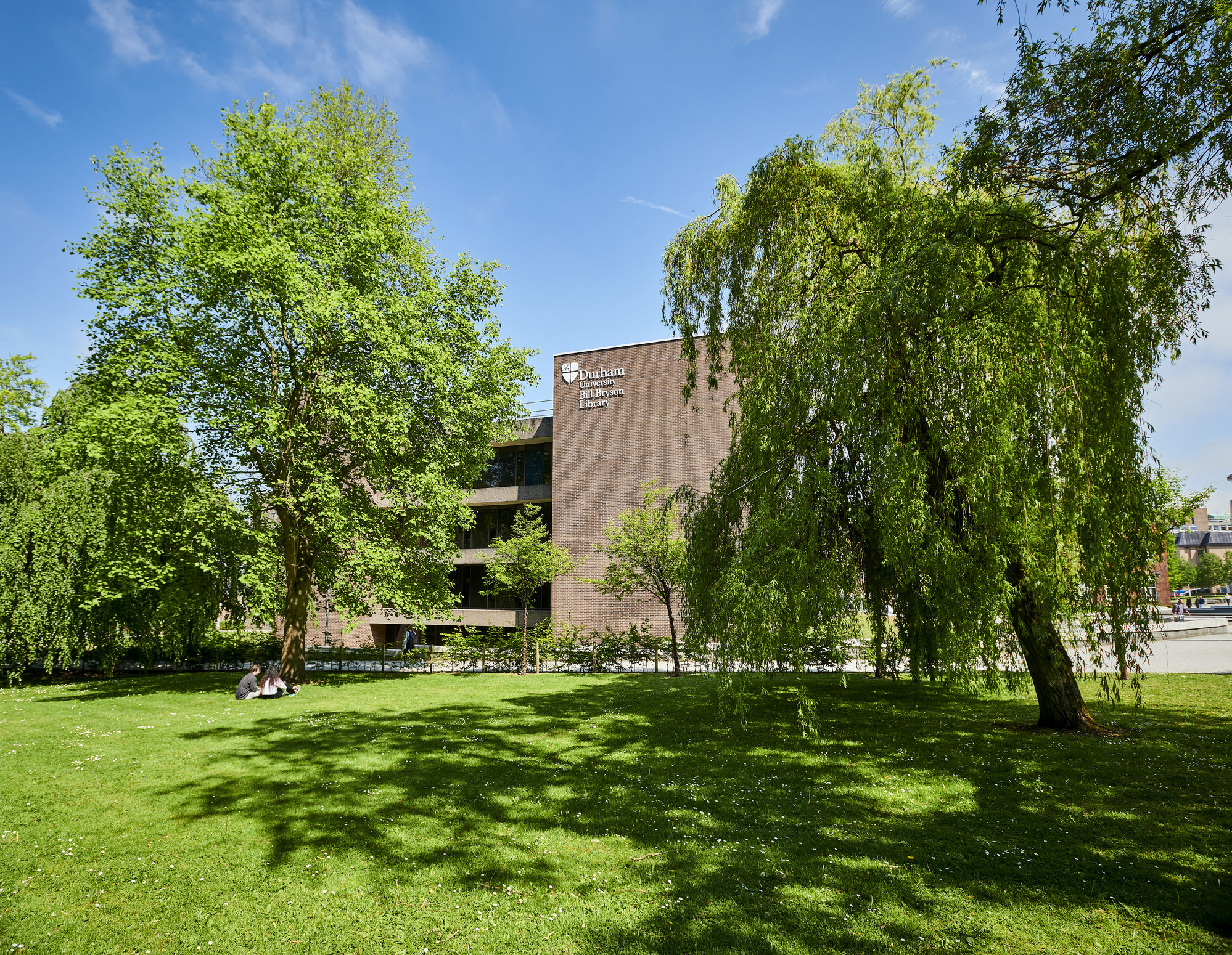 The Bill Bryson Library building with trees either side and in front