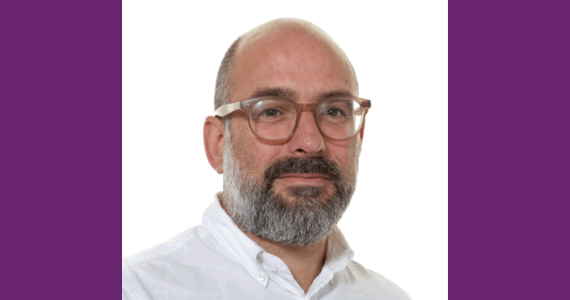 Male adult with beard and glasses