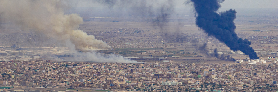 An aerial photo showing fires of fuel and ammunition warehouses in the Jabra area south of the Sudanese capital Khartoum