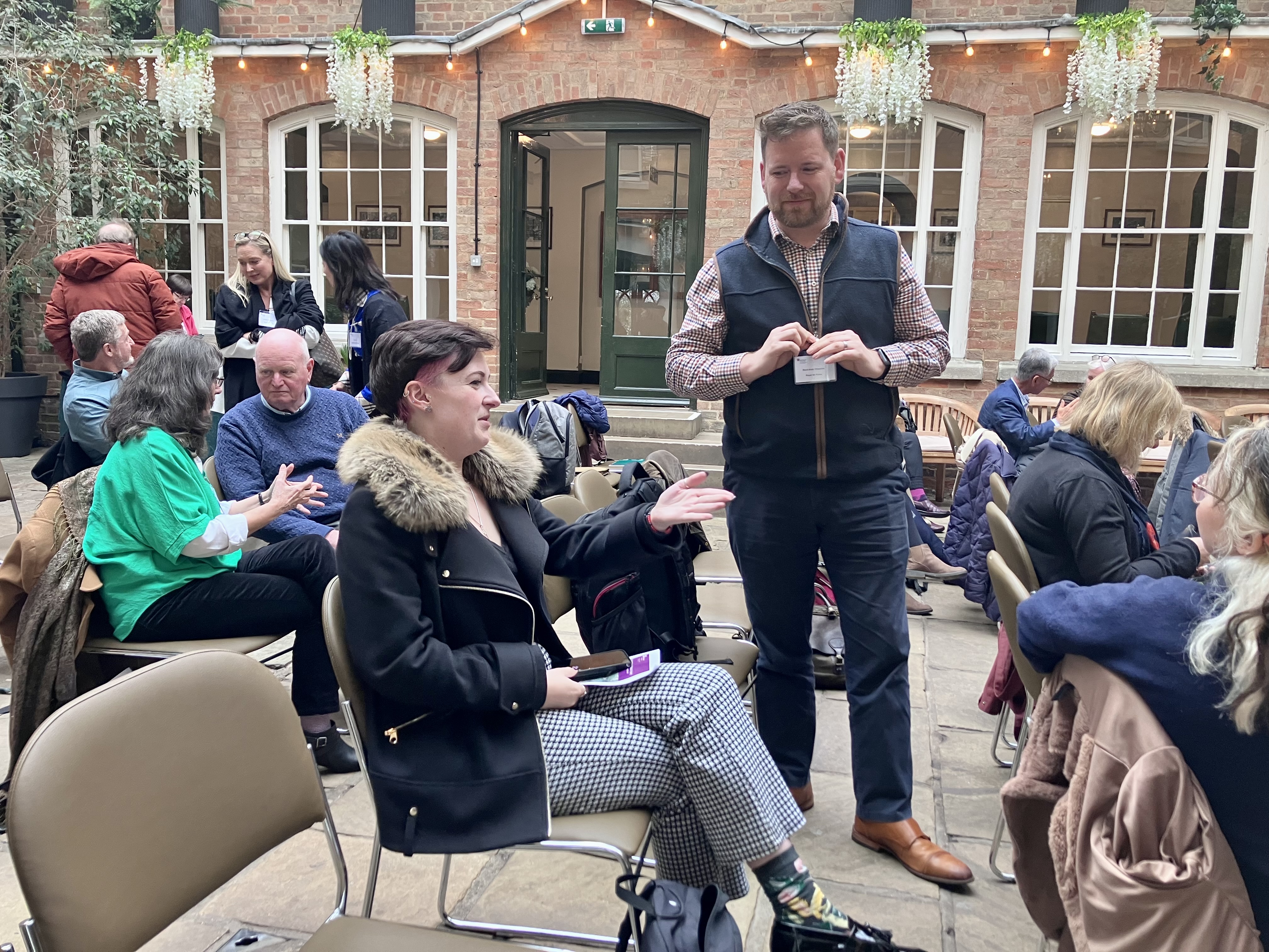 People talking during a coffee break at a conference