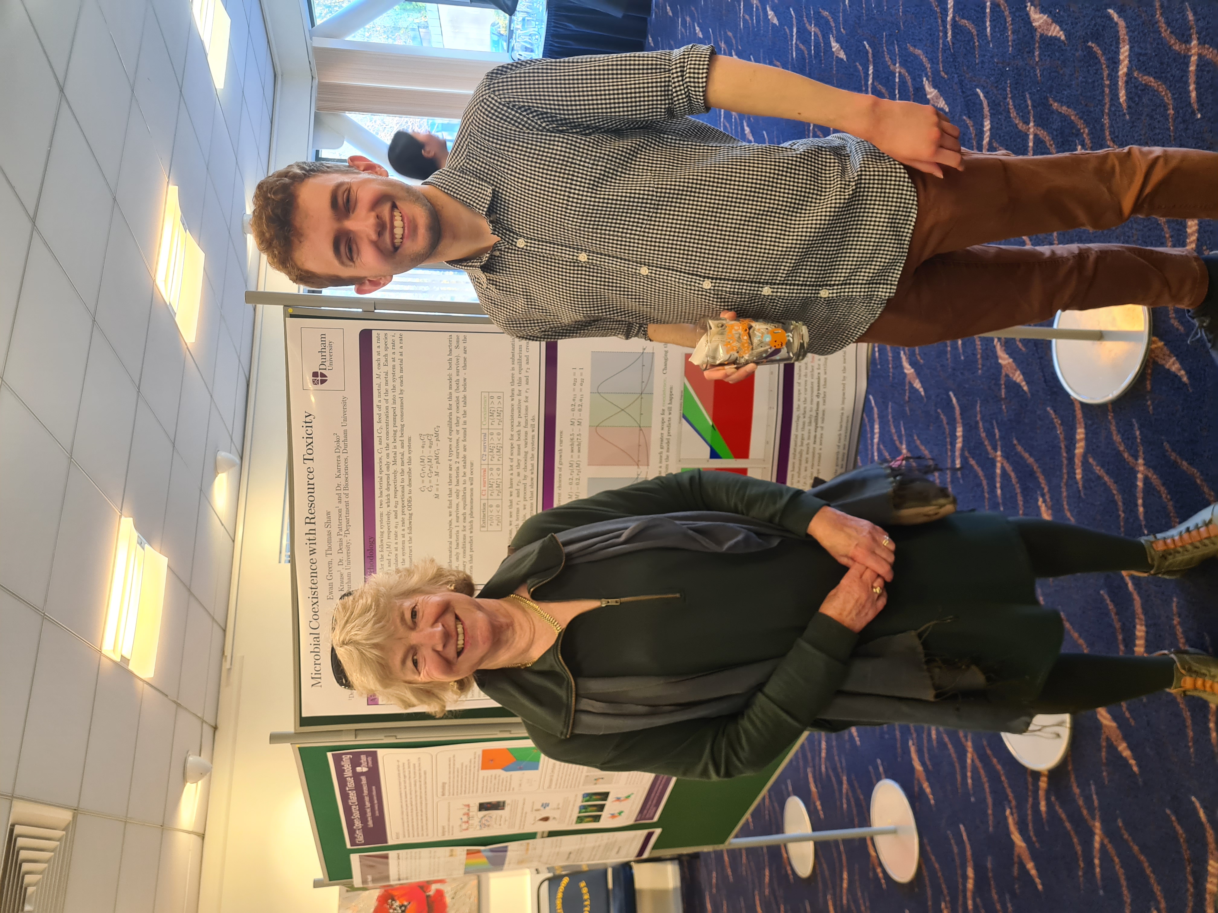 Student and professor at poster session