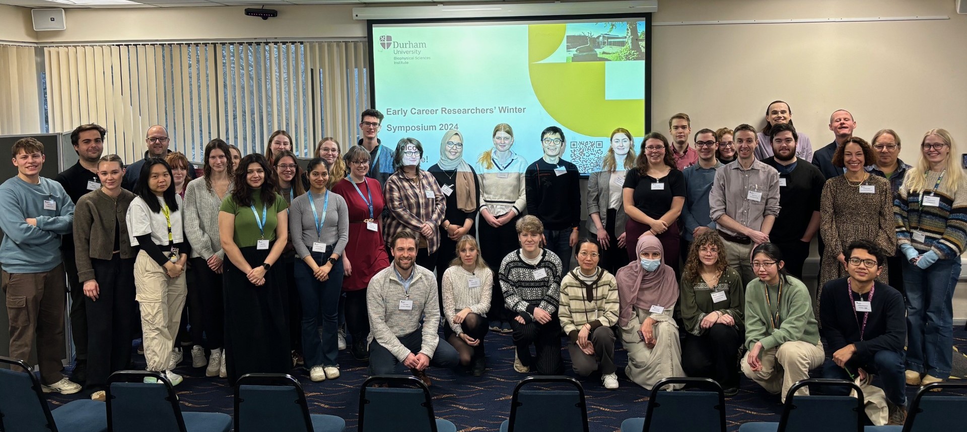 2024 ECR Symposium attendees posing for conference photograph