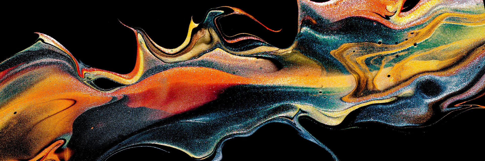 Swirls of various colours on a black background