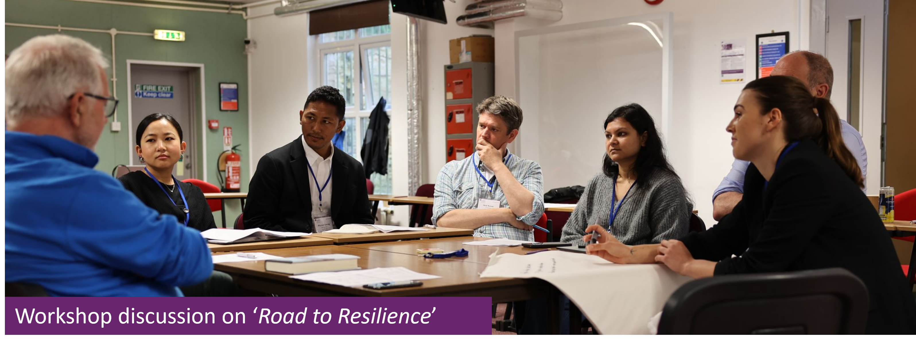 several academics sitting around a table