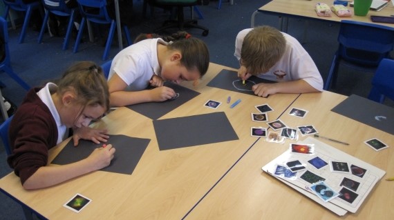 Pupils working on cosmascope art