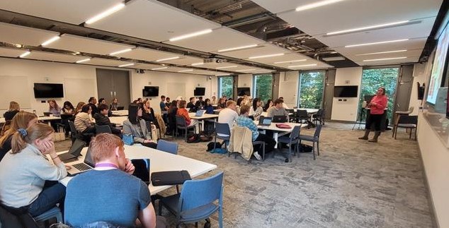 Students sitting in a classroom listening to a careers presentation