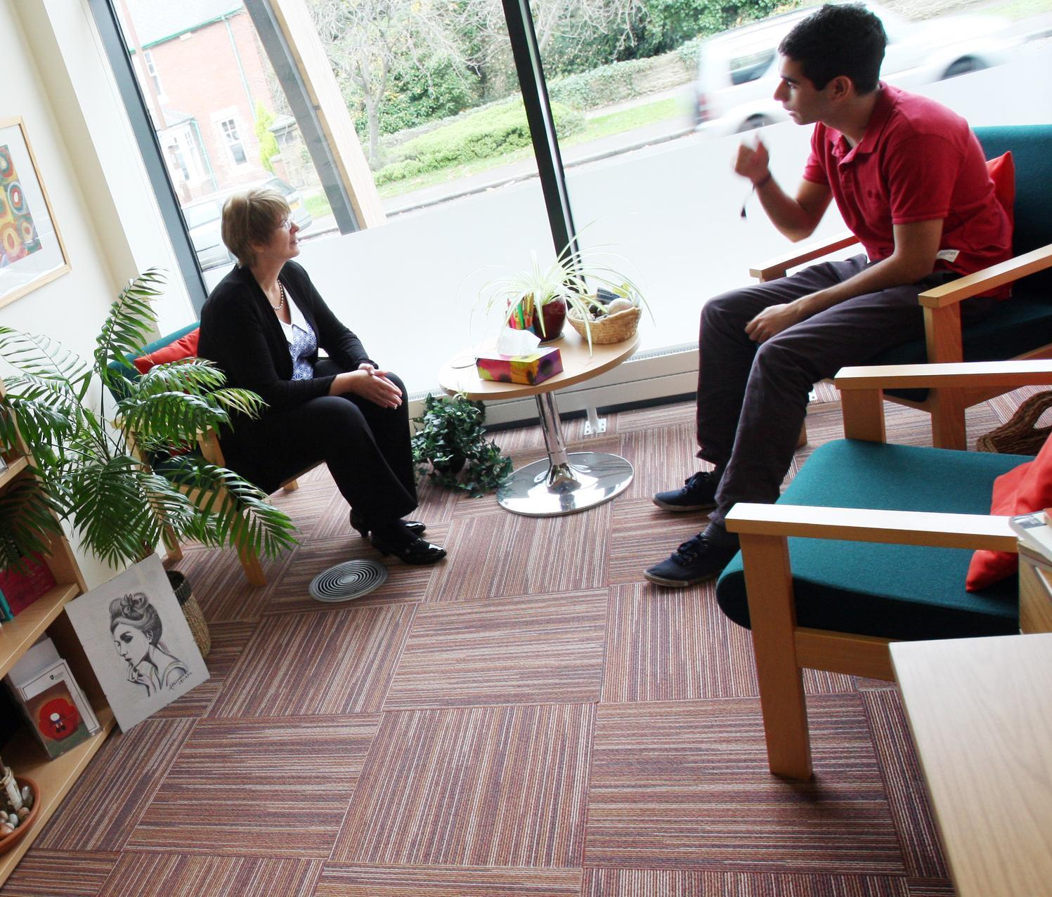 Student chatting with a counsellor