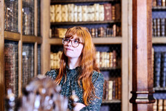 TStudent browsing books in library